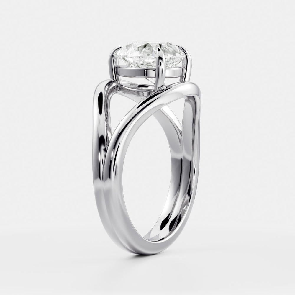 
                      
                        The Elise Ring - Split Shank Pear Solitaire
                      
                    