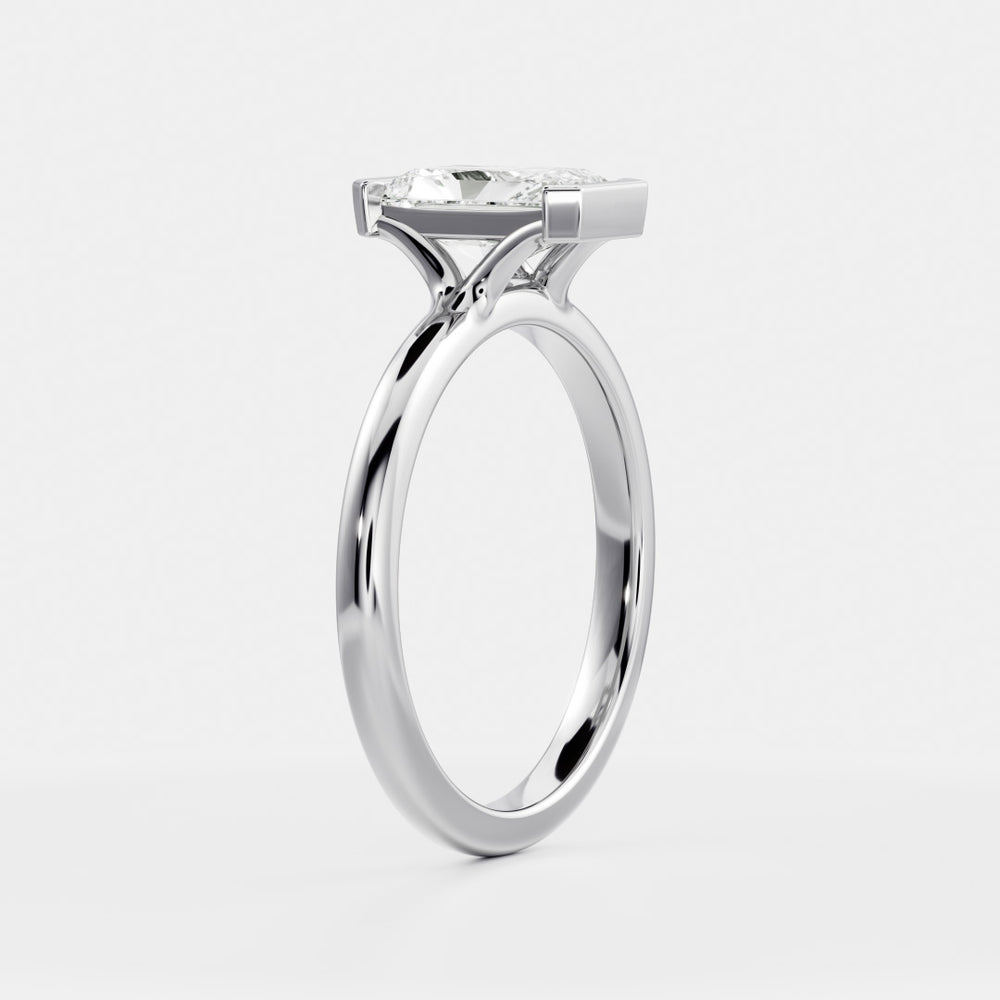 
                      
                        The Vienna Ring - Radiant Half Bezel Solitaire
                      
                    