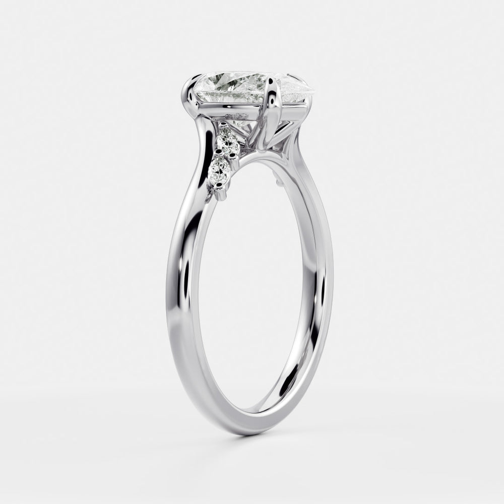 
                      
                        The Amira Ring - Pear with Marquise Accents
                      
                    
