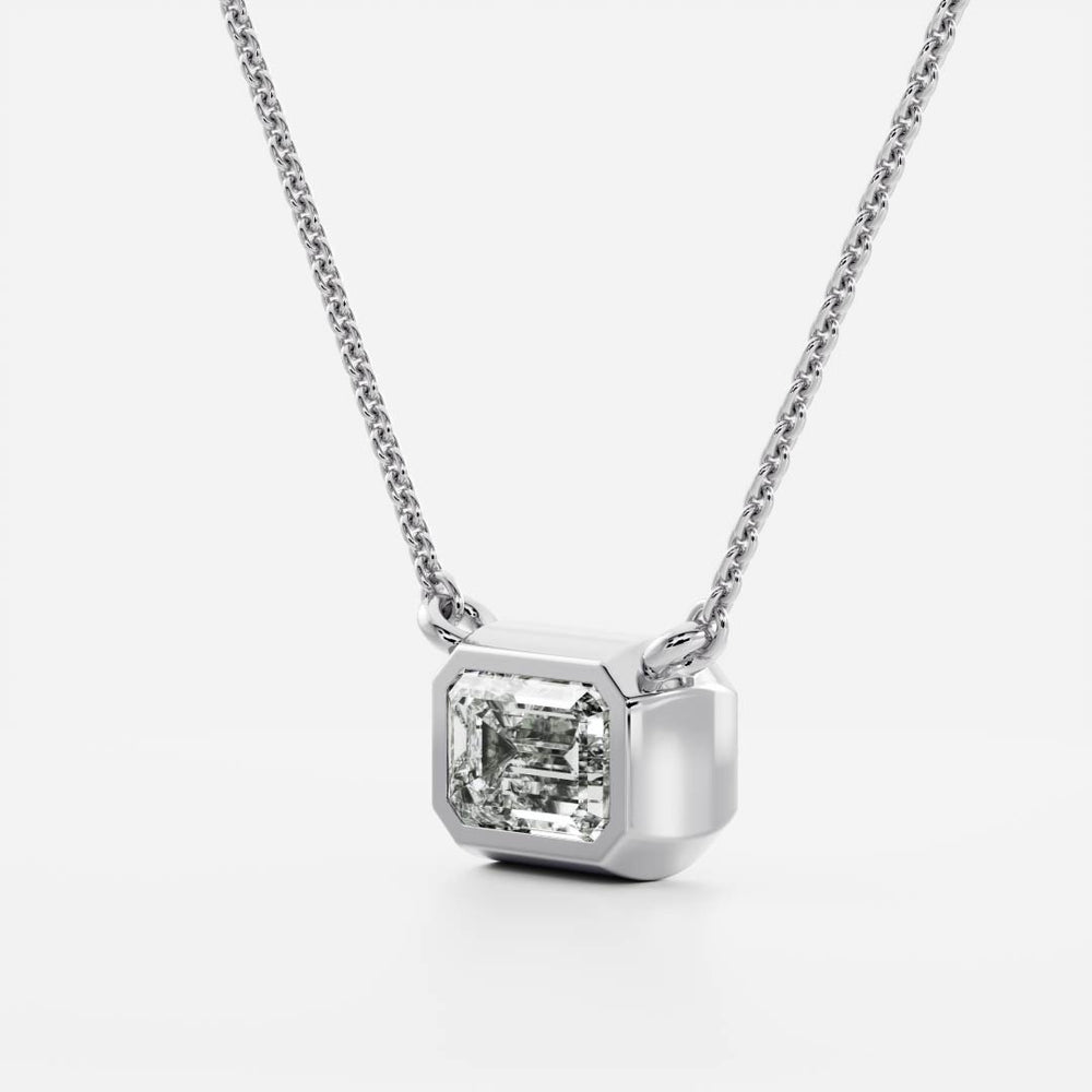 
                      
                        The Vera Necklace - Emerald Bezel Pendant
                      
                    