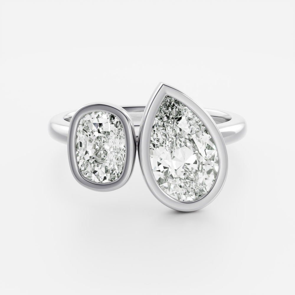 
                      
                        The Anaïs Ring - Elongated Cushion and Pear Bezel Toi et Moi
                      
                    