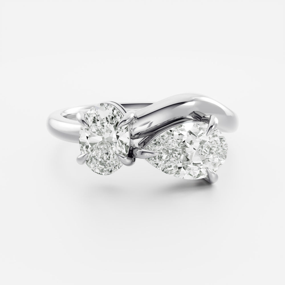 
                      
                        The Vivienne Ring - Oval and Pear Curved Toi et Moi
                      
                    