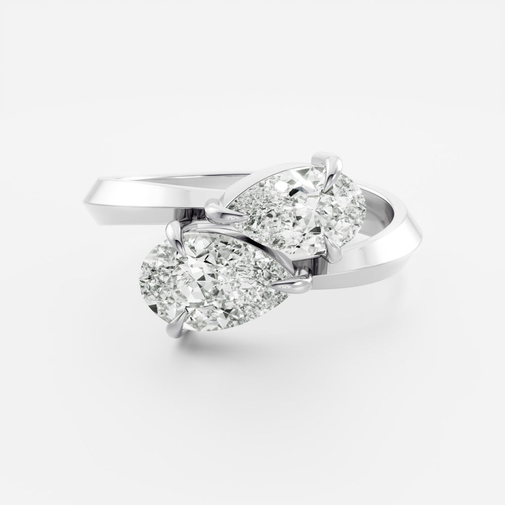 
                      
                        The Isabeau Ring - Twisted Knife Edge Pear Toi et Moi
                      
                    