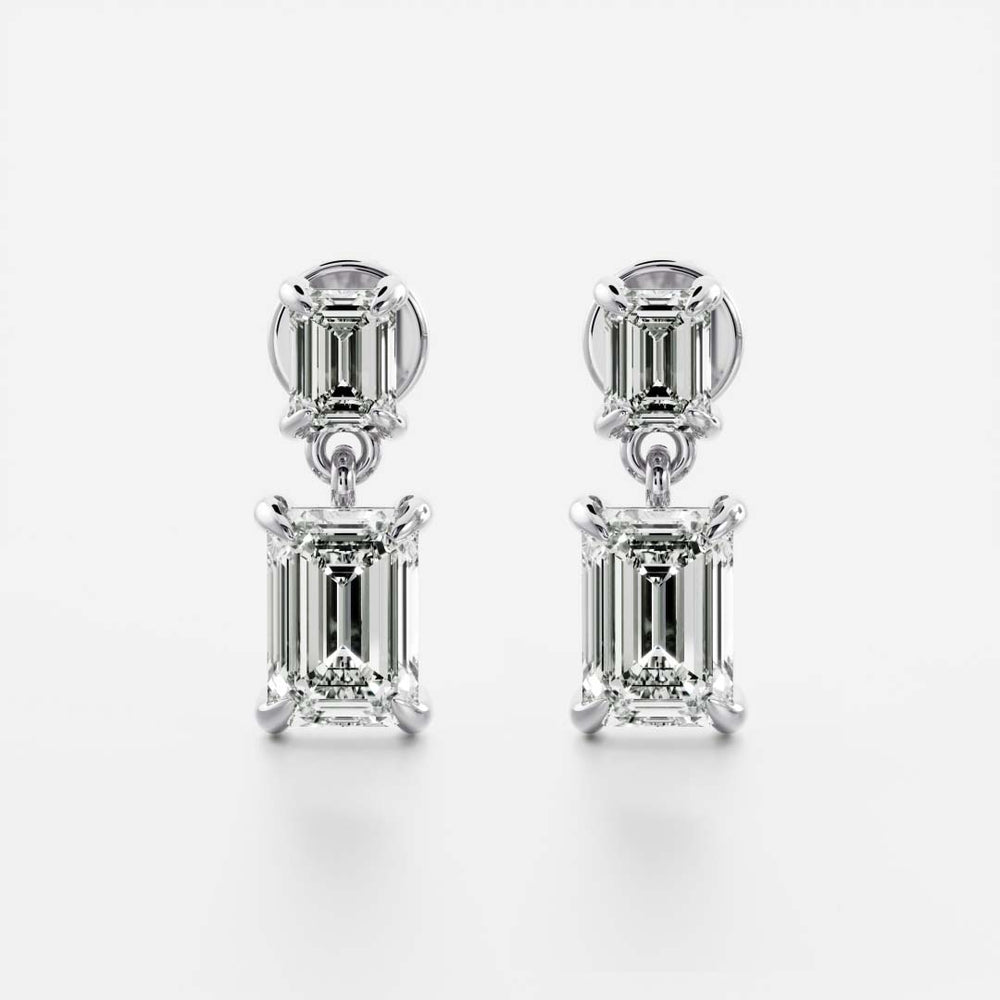 
                      
                        The Arietta Earrings - Emerald Double Drop Earrings
                      
                    