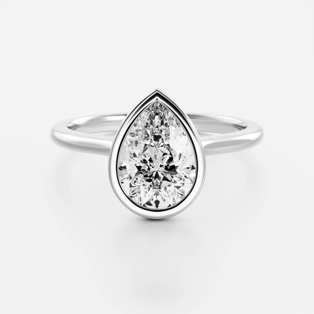 
                      
                        The Sophia Ring - Pear Bezel Solitaire
                      
                    