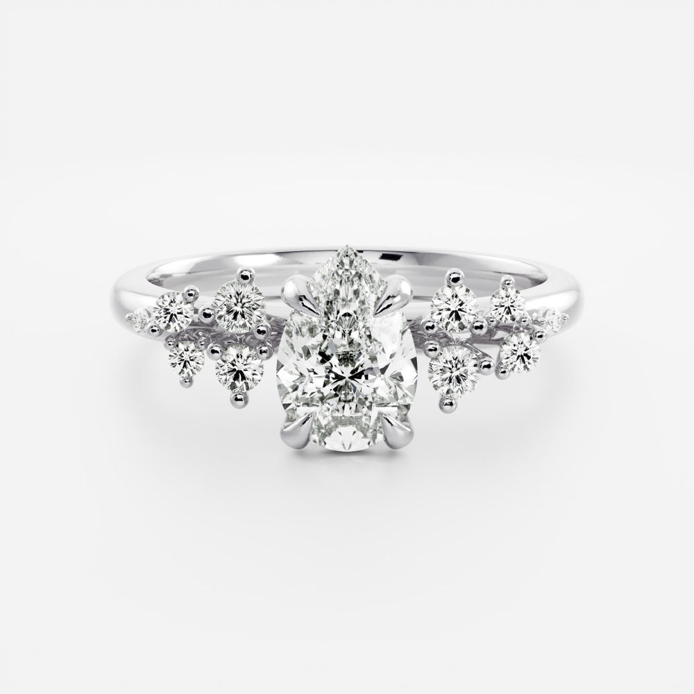 
                      
                        The Aurora Ring - Pear with Round Brilliant Accents
                      
                    