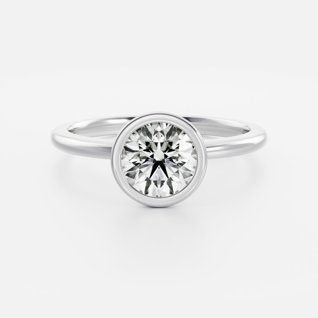 The Isla Ring - Round Bezel Solitaire