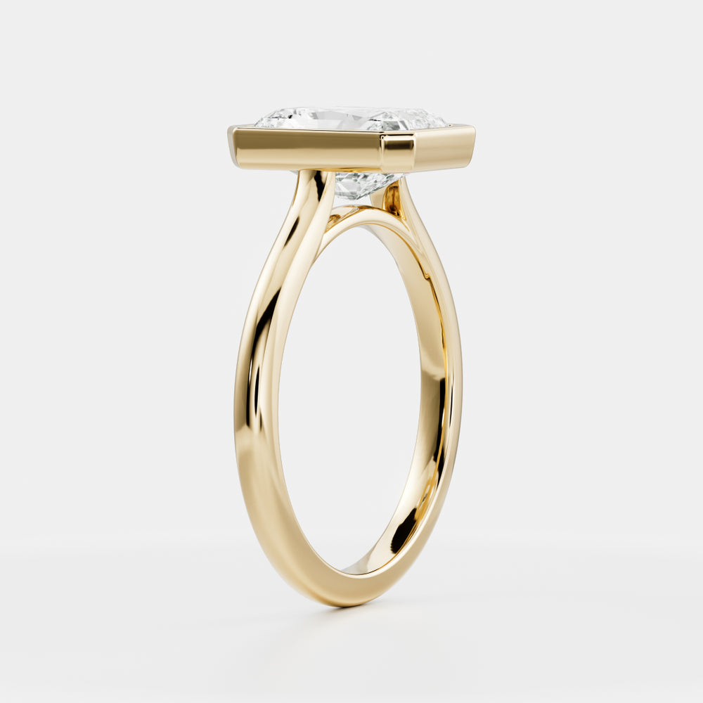 
                      
                        The Vienna Ring - Radiant Bezel Solitaire
                      
                    