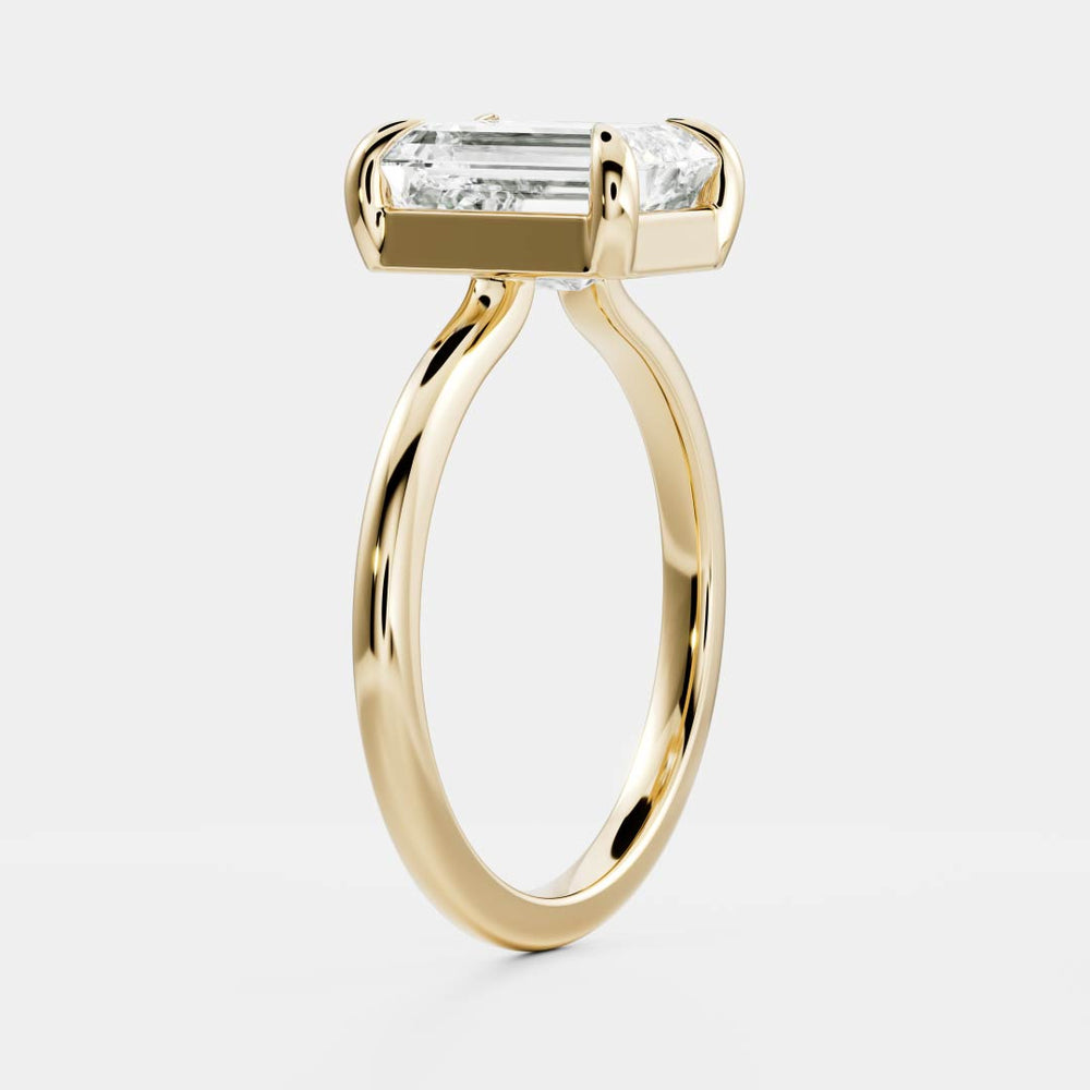 
                      
                        The Audrey Ring - 1.9ct Moissanite Emerald Low Set Solitaire
                      
                    