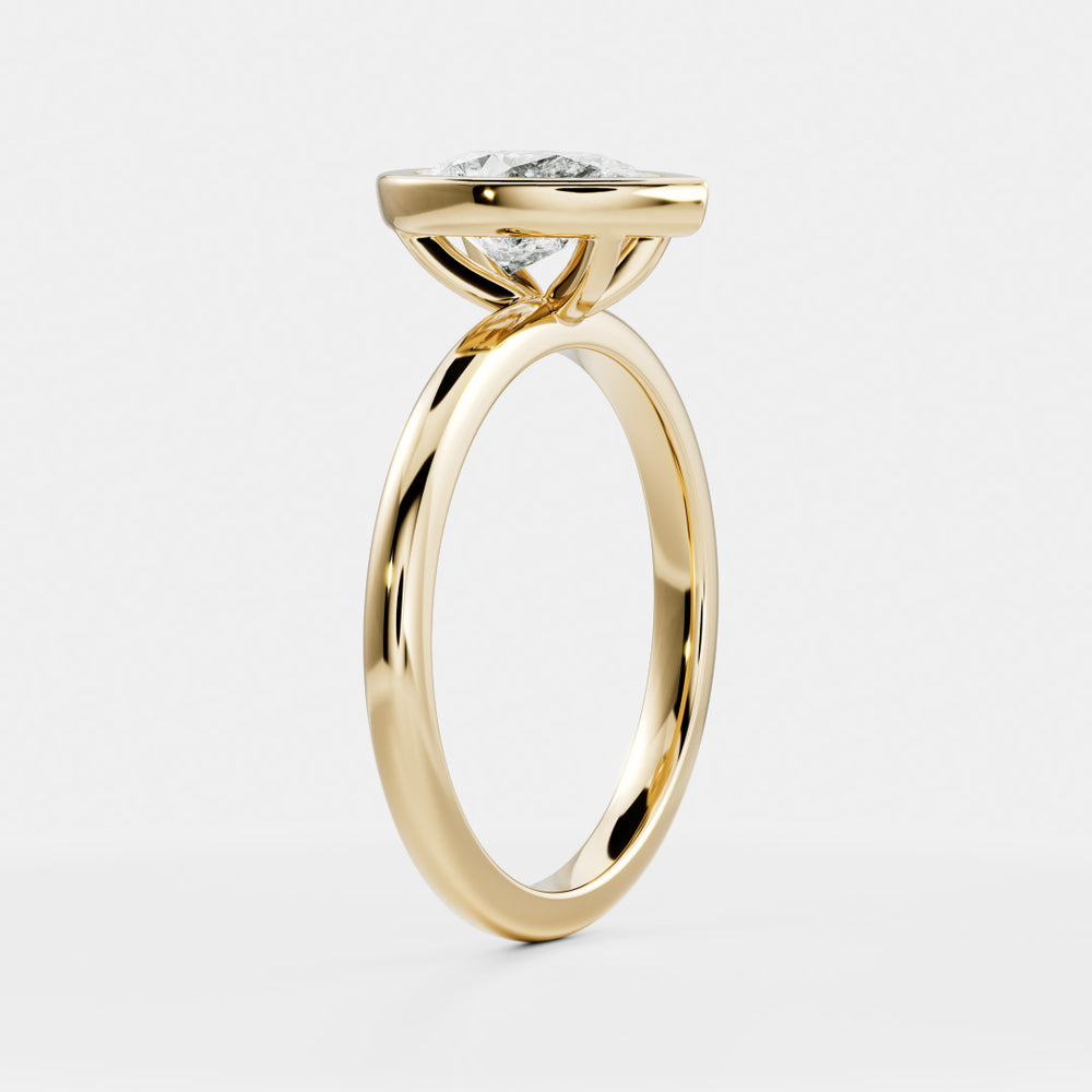 
                      
                        The Sophia Ring - Pear Bezel Solitaire
                      
                    