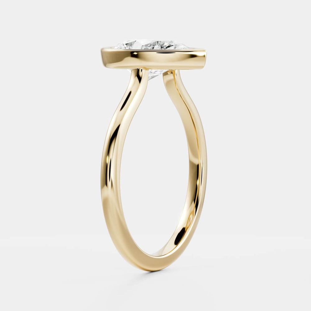 
                      
                        The Sophia Ring - Pear Bezel Solitaire
                      
                    