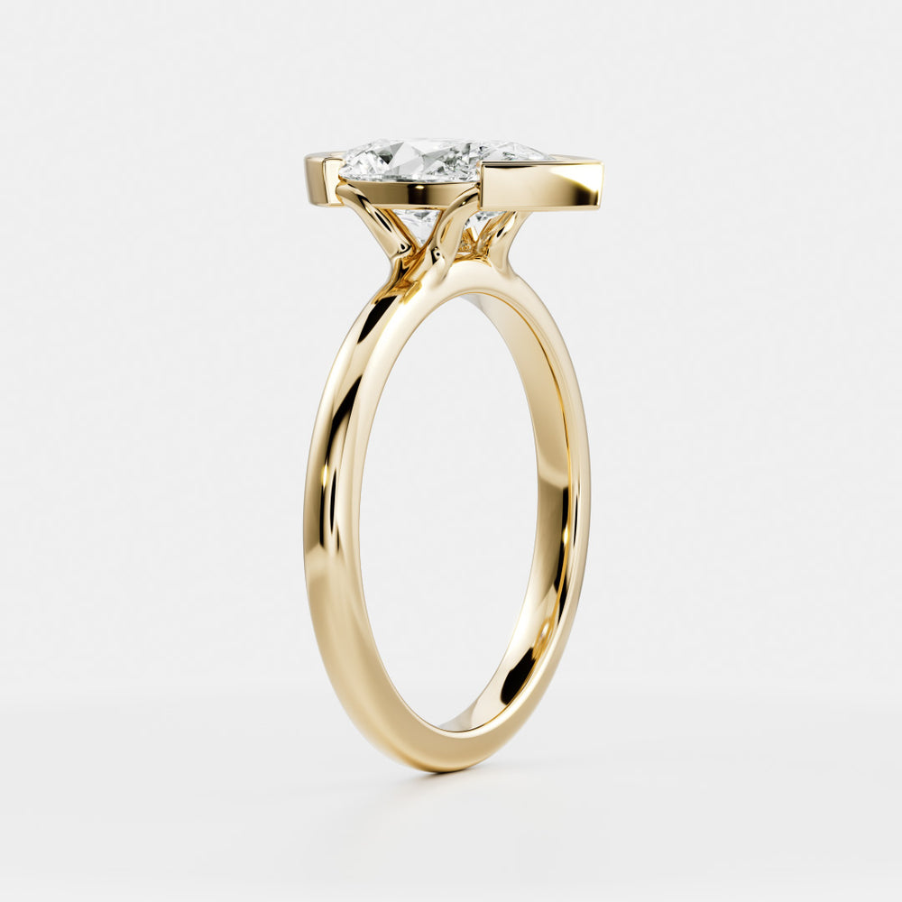 
                      
                        The Sophia Ring - Pear Half Bezel Solitaire
                      
                    