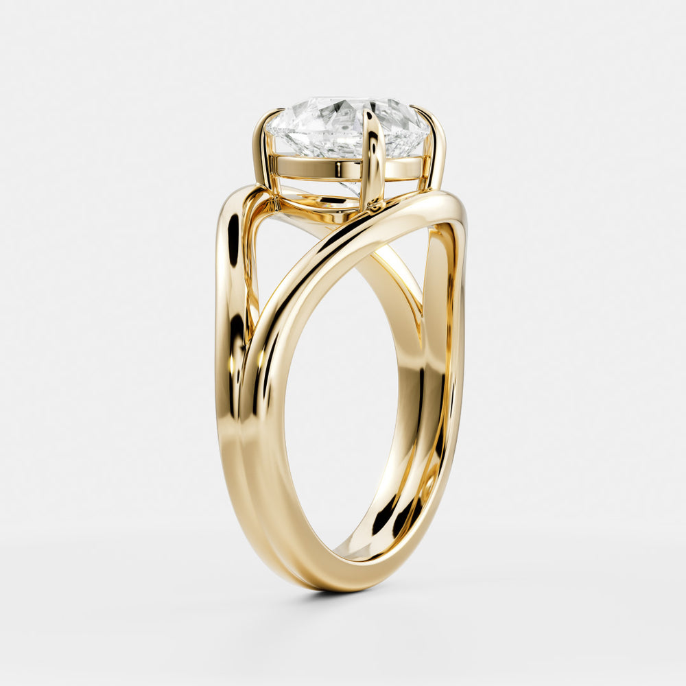 
                      
                        The Elise Ring - Split Shank Pear Solitaire
                      
                    