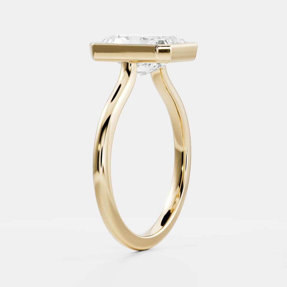 
                      
                        The Vienna Ring - Radiant Bezel Solitaire
                      
                    