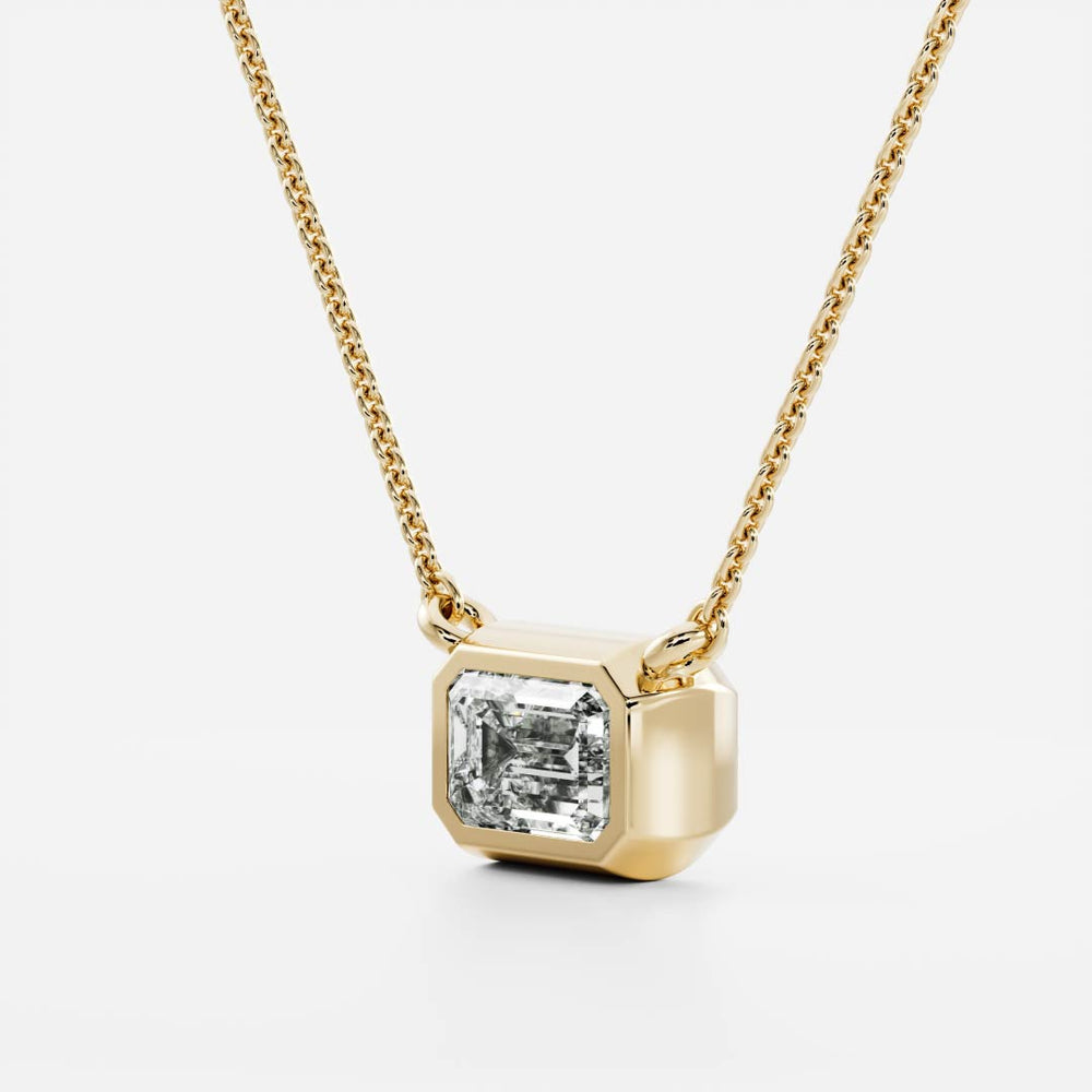 
                      
                        The Vera Necklace - Emerald Bezel Pendant
                      
                    