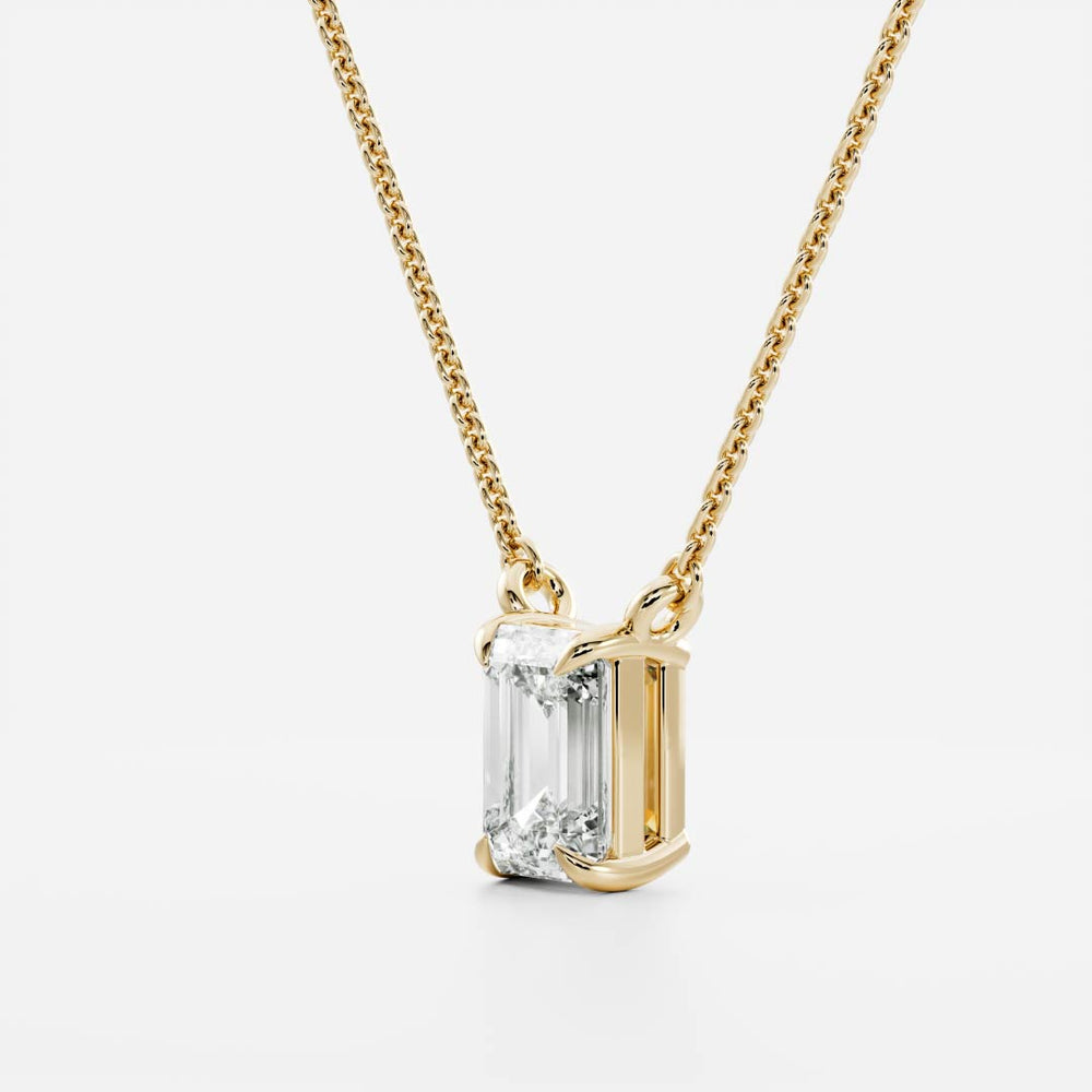 
                      
                        The Iris Necklace - Emerald Pendant
                      
                    