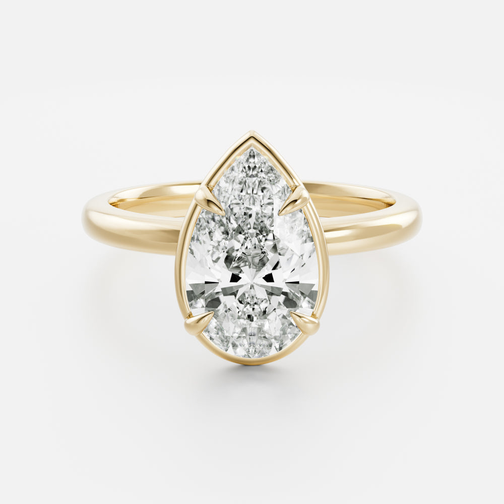 
                      
                        The Sophia Ring - Pear Georgian Solitaire
                      
                    