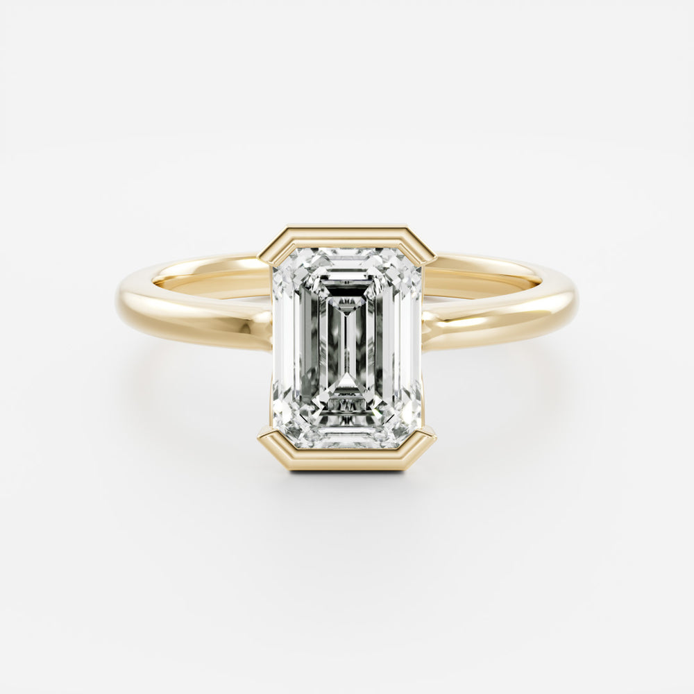 The Audrey Ring - Emerald Half Bezel Solitaire