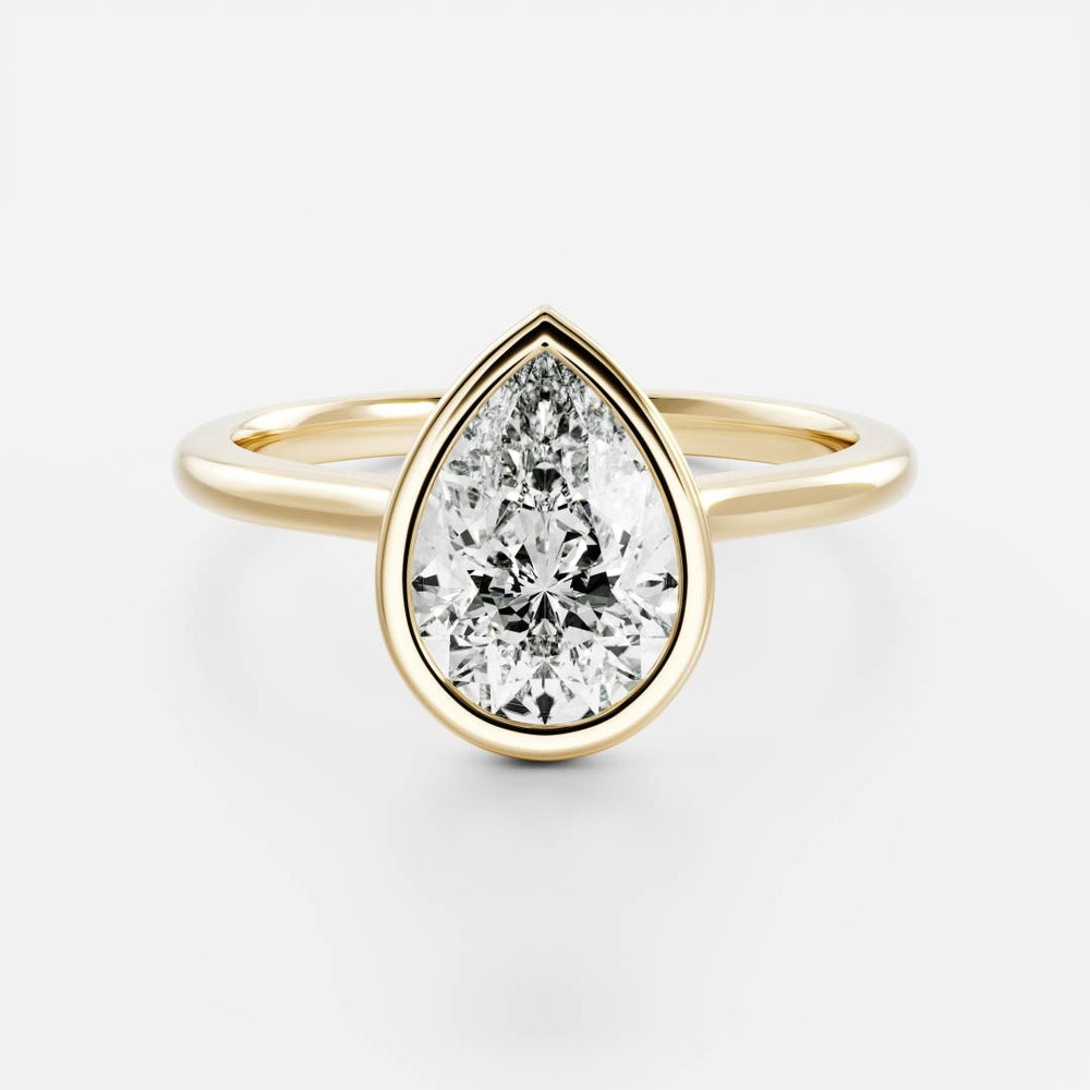 
                      
                        The Sophia Ring - Pear Bezel Solitaire
                      
                    