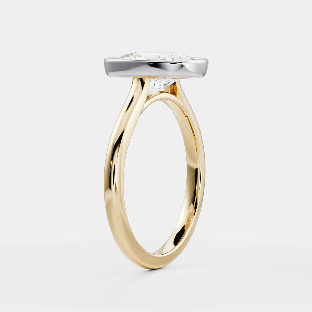 
                      
                        The Ophelia Ring - Elongated Cushion Bezel Solitaire
                      
                    