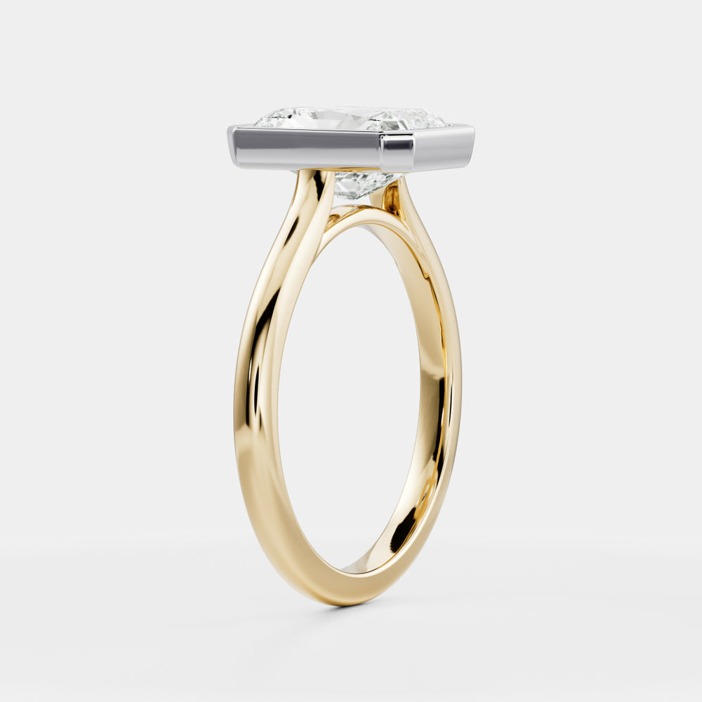 
                      
                        The Vienna Ring - Radiant Bezel Solitaire
                      
                    