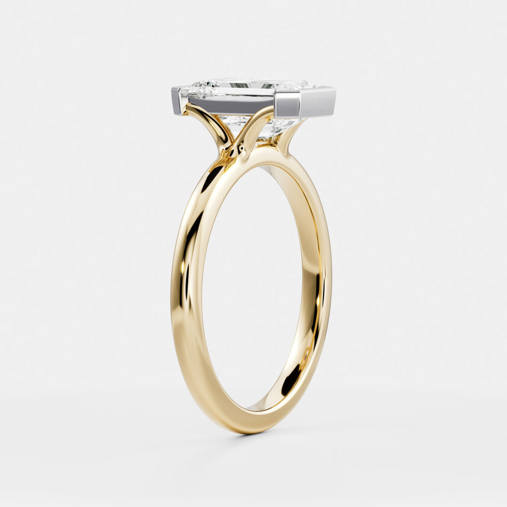 
                      
                        The Audrey Ring - Emerald Half Bezel Solitaire
                      
                    