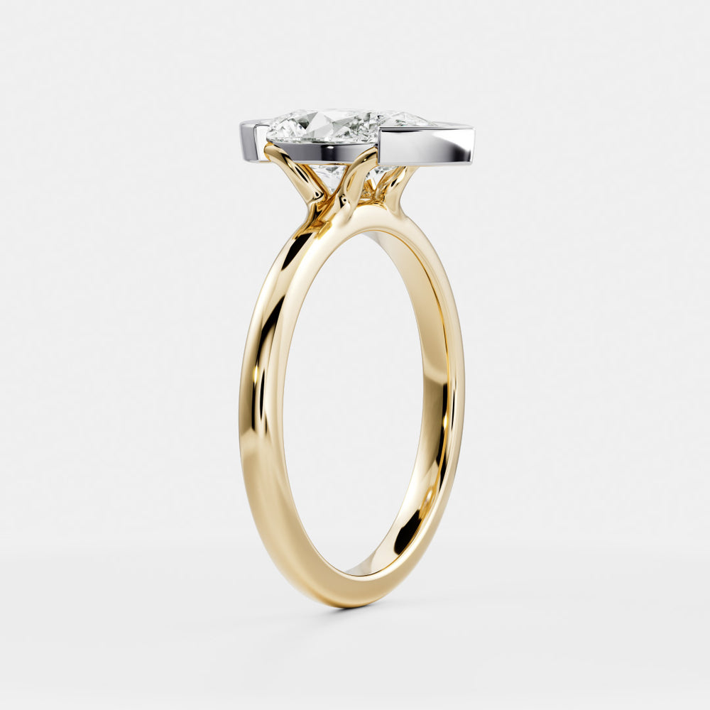 
                      
                        The Sophia Ring - Pear Half Bezel Solitaire
                      
                    