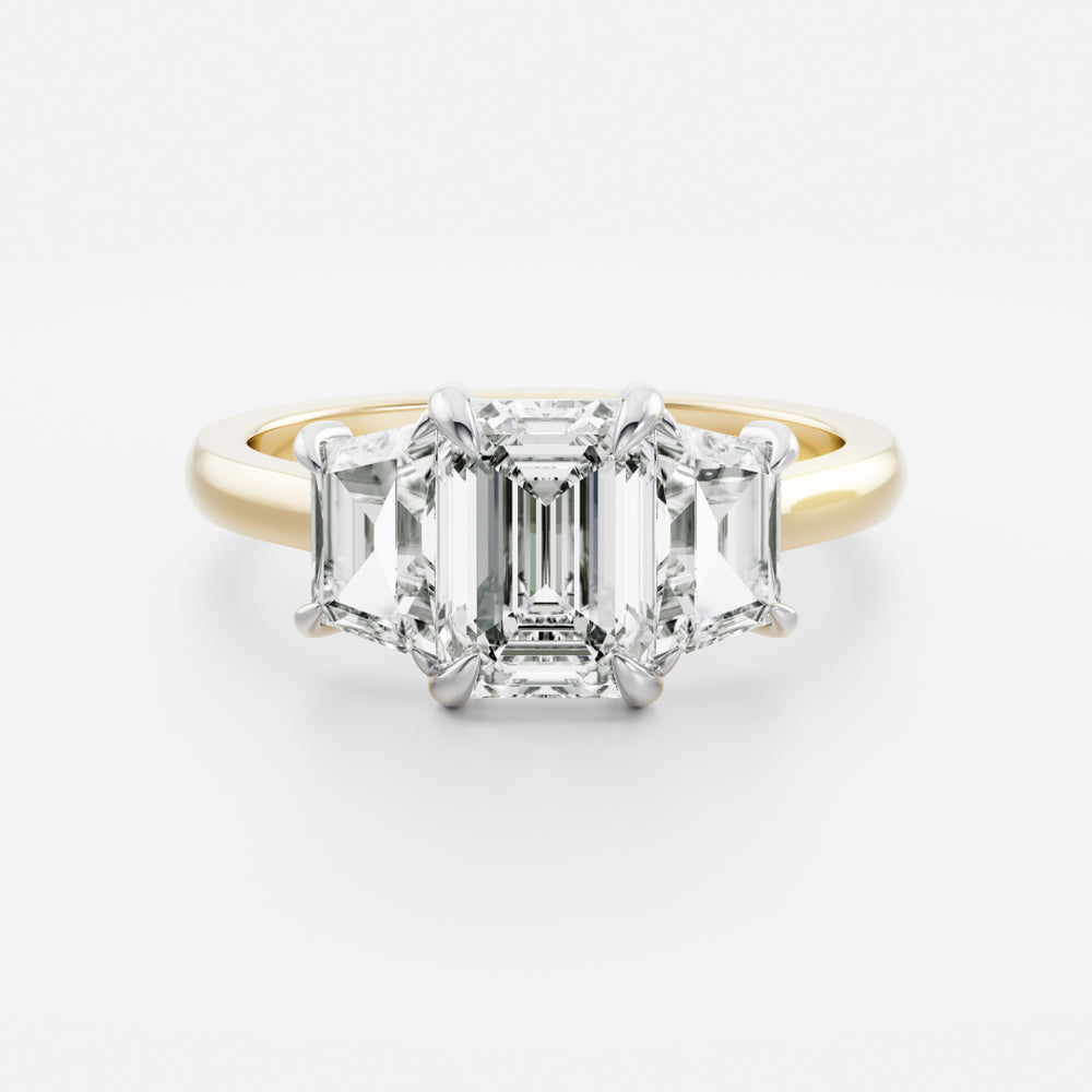 
                      
                        The Ines Ring - Emerald and Trapezoid Trilogy
                      
                    