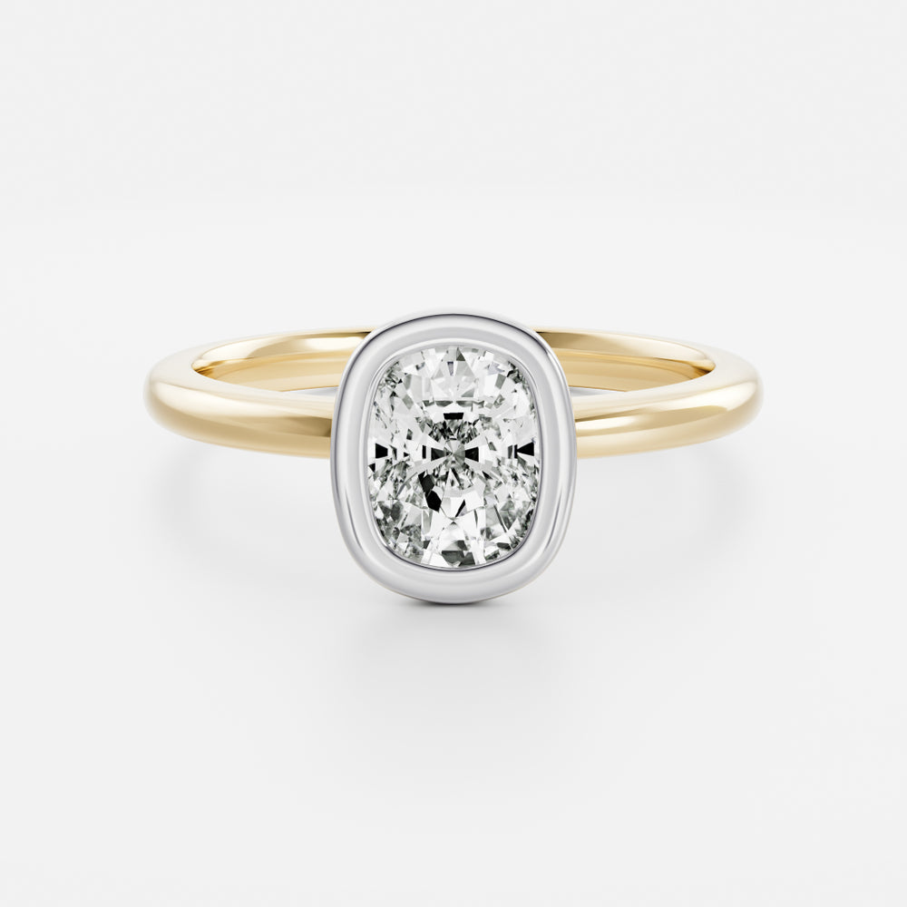 
                      
                        The Ophelia Ring - Elongated Cushion Bezel Solitaire
                      
                    