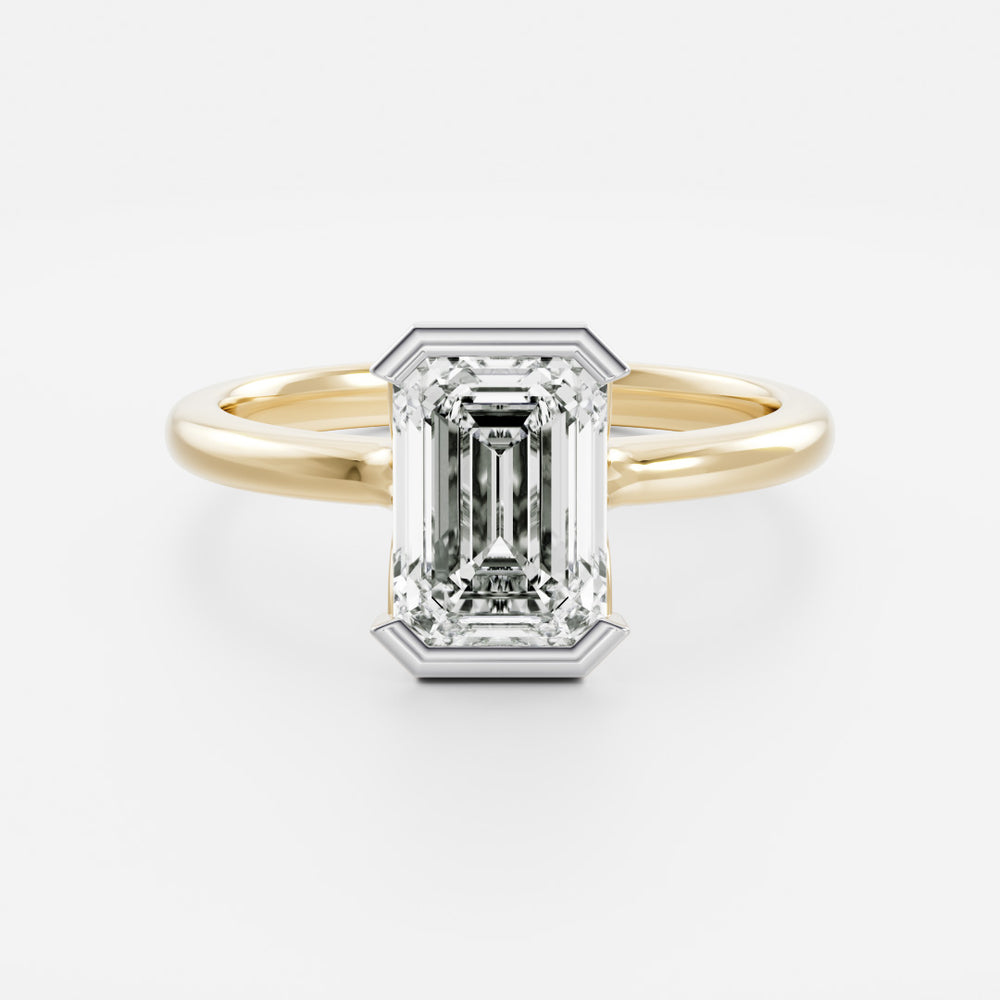 
                      
                        The Audrey Ring - Emerald Half Bezel Solitaire
                      
                    