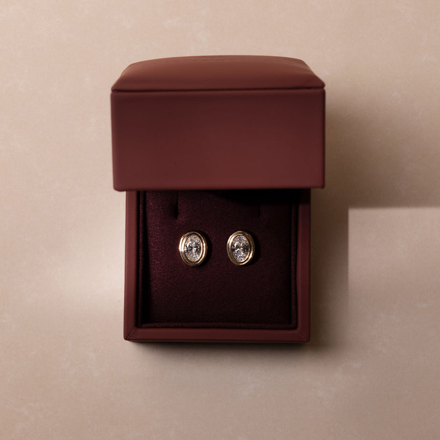 The Adira Earrings - Oval Double Bezel Studs