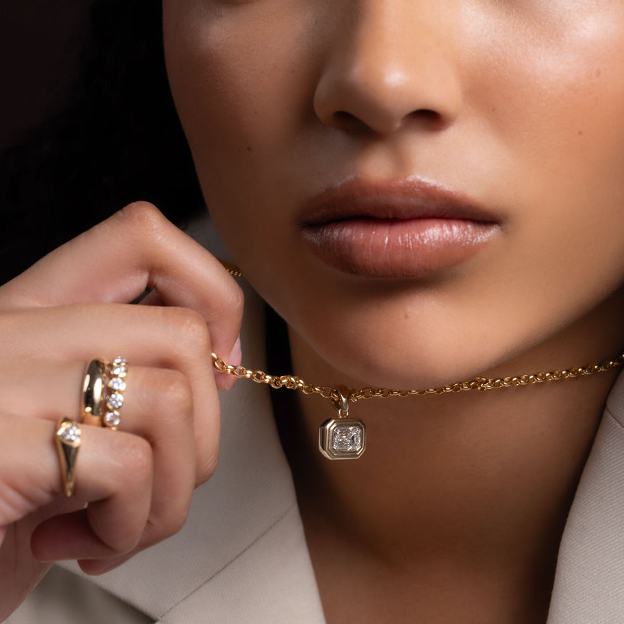 The Adira Emerald Double Bezel Pendant