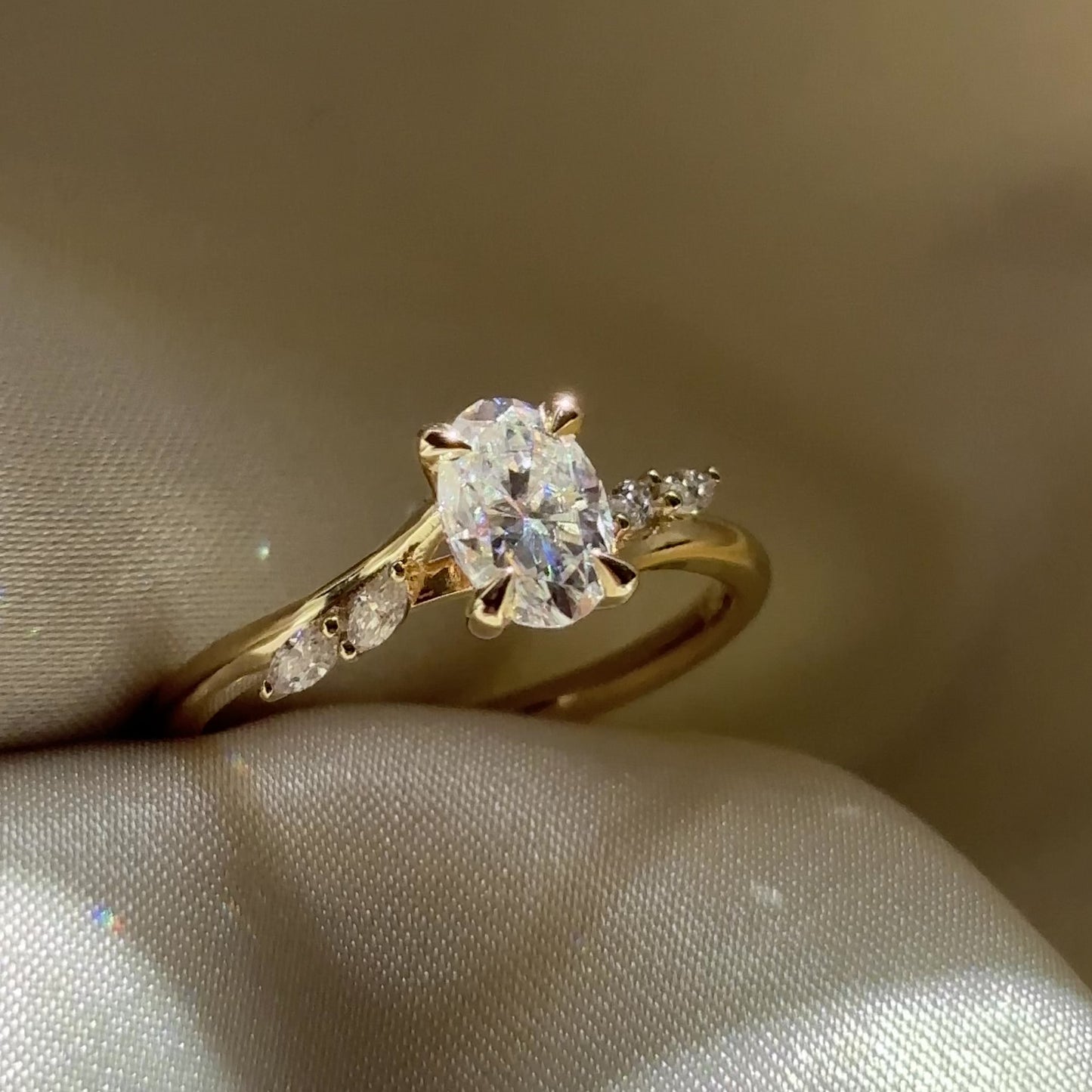 The Amira Ring™ - 1.0ct Moissanite Oval with Marquise Accents