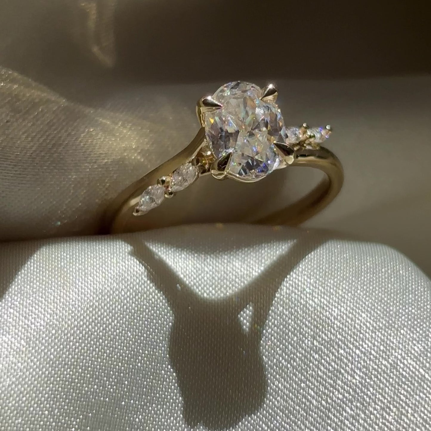 The Amira Ring™ - 1.5ct Moissanite Oval with Marquise Accents