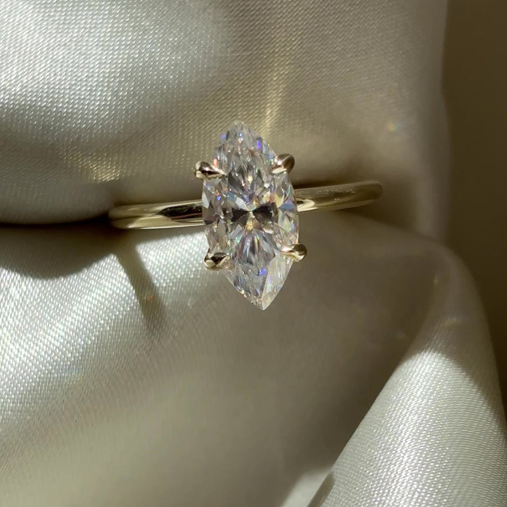 
                      
                        Load and play video in Gallery viewer, The Arie Ring - 1.8ct Moissanite Marquise Solitaire
                      
                    