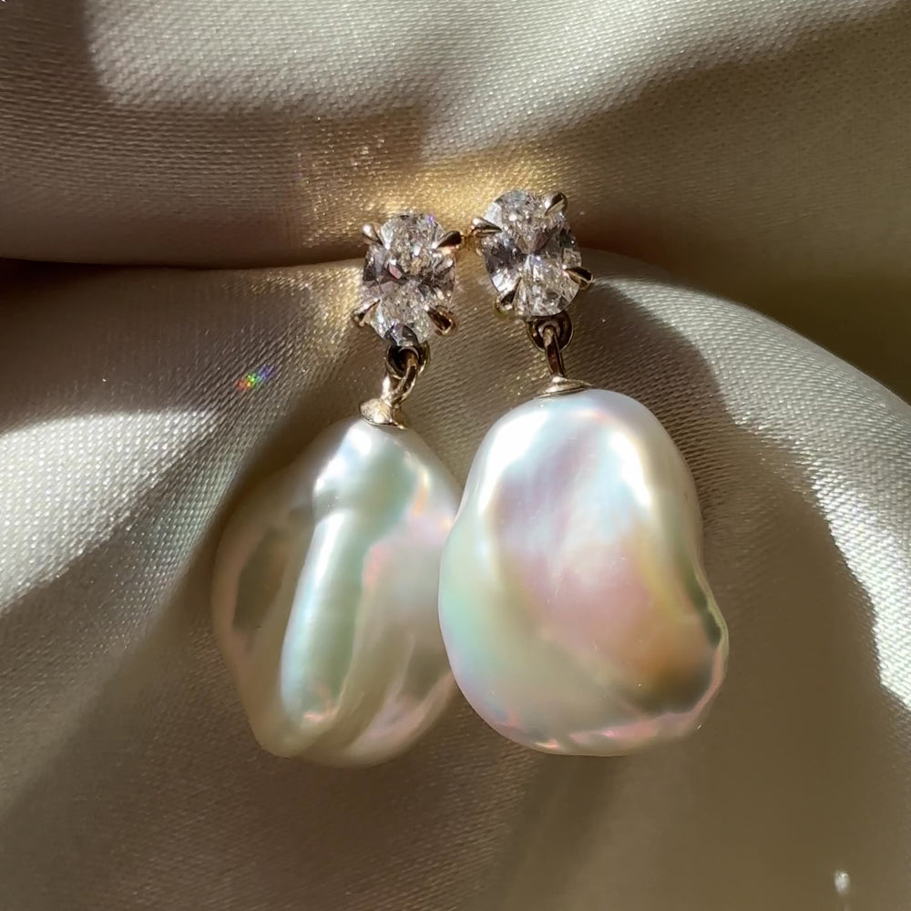 
                      
                        Load and play video in Gallery viewer, The Angelina Earrings - 0.6CTTW Keshi Pearl Lab Diamond Oval Drop Earrings
                      
                    