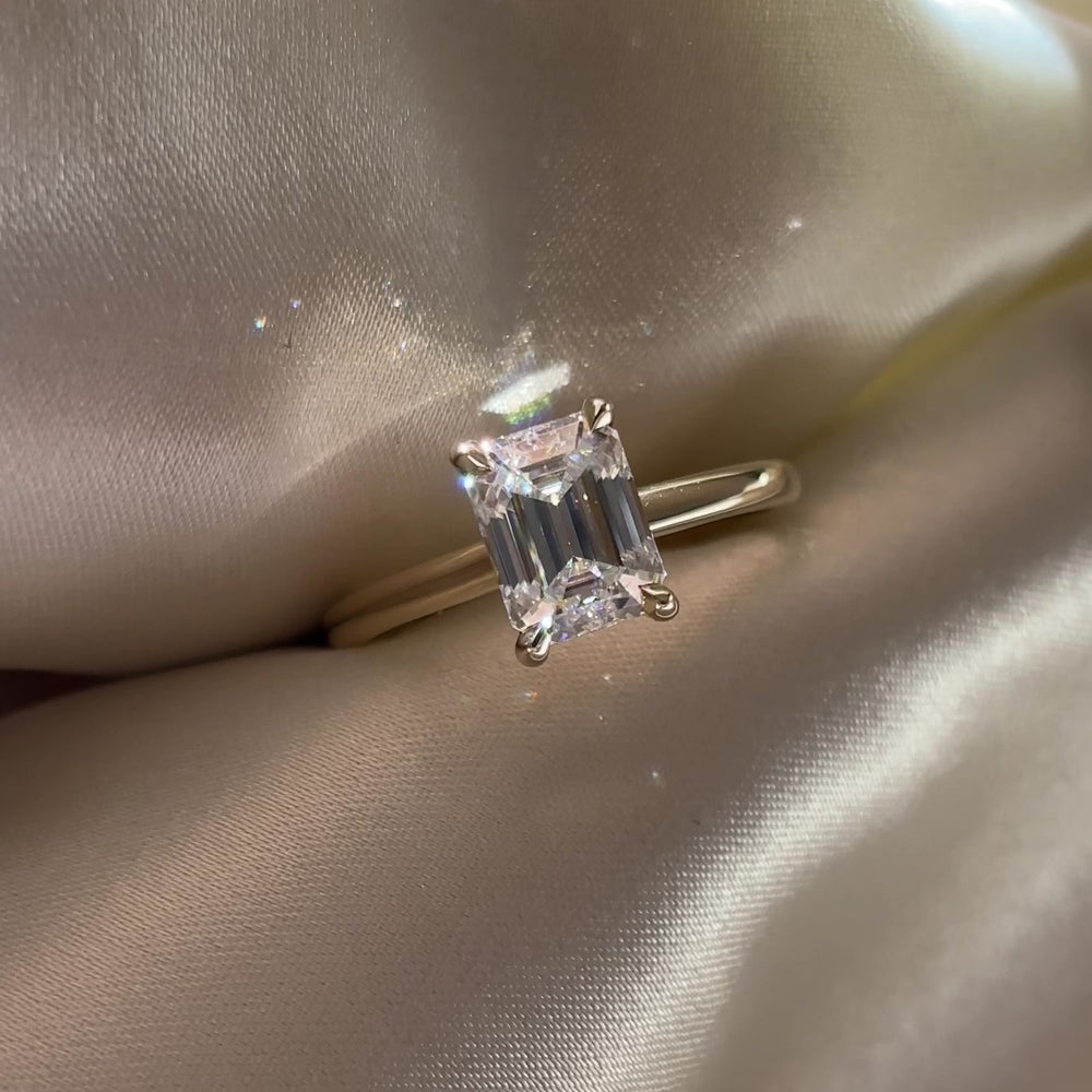 
                      
                        Load and play video in Gallery viewer, The Audrey Ring - 1.9ct Moissanite Emerald Cathedral Solitaire
                      
                    
