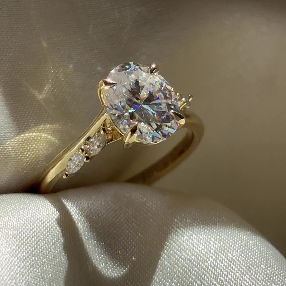 The Amira Ring™ - 2.1ct Moissanite Oval with Marquise Accents
