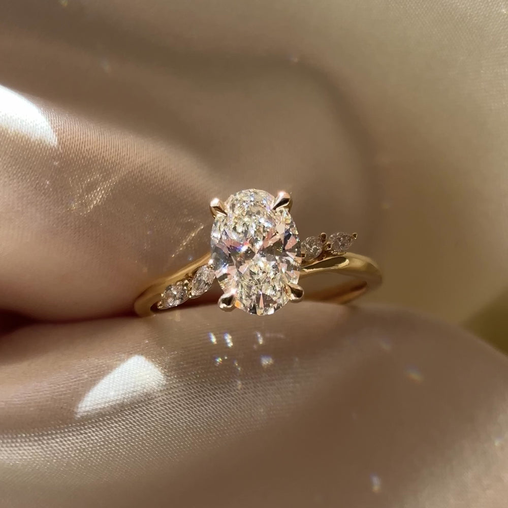 
                      
                        Load and play video in Gallery viewer, The Amira Ring - 1.52ct Lab Grown Diamond Oval with Marquise Accents
                      
                    