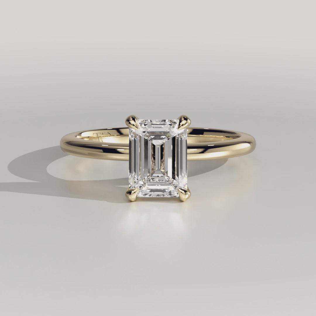 The Audrey Ring - Emerald Solitaire