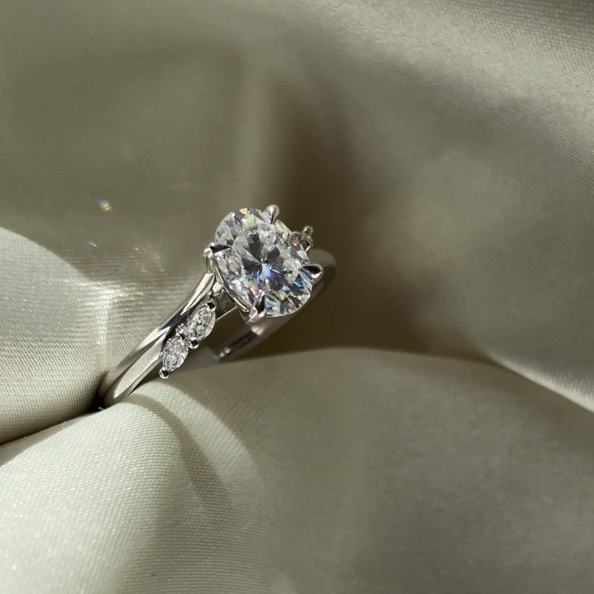The Amira Ring™ - 1.5ct Moissanite Oval with Marquise Accents