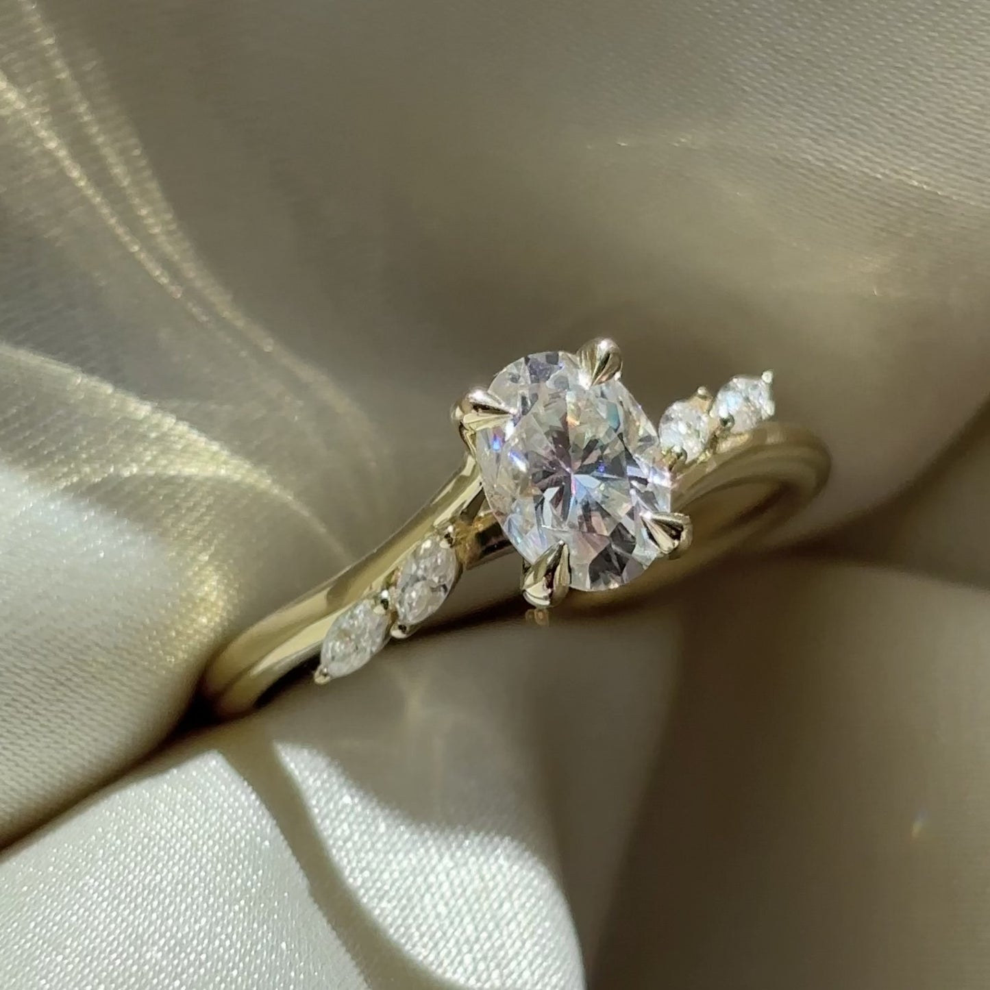 The Amira Ring™ - 1.0ct Moissanite Oval with Marquise Accents