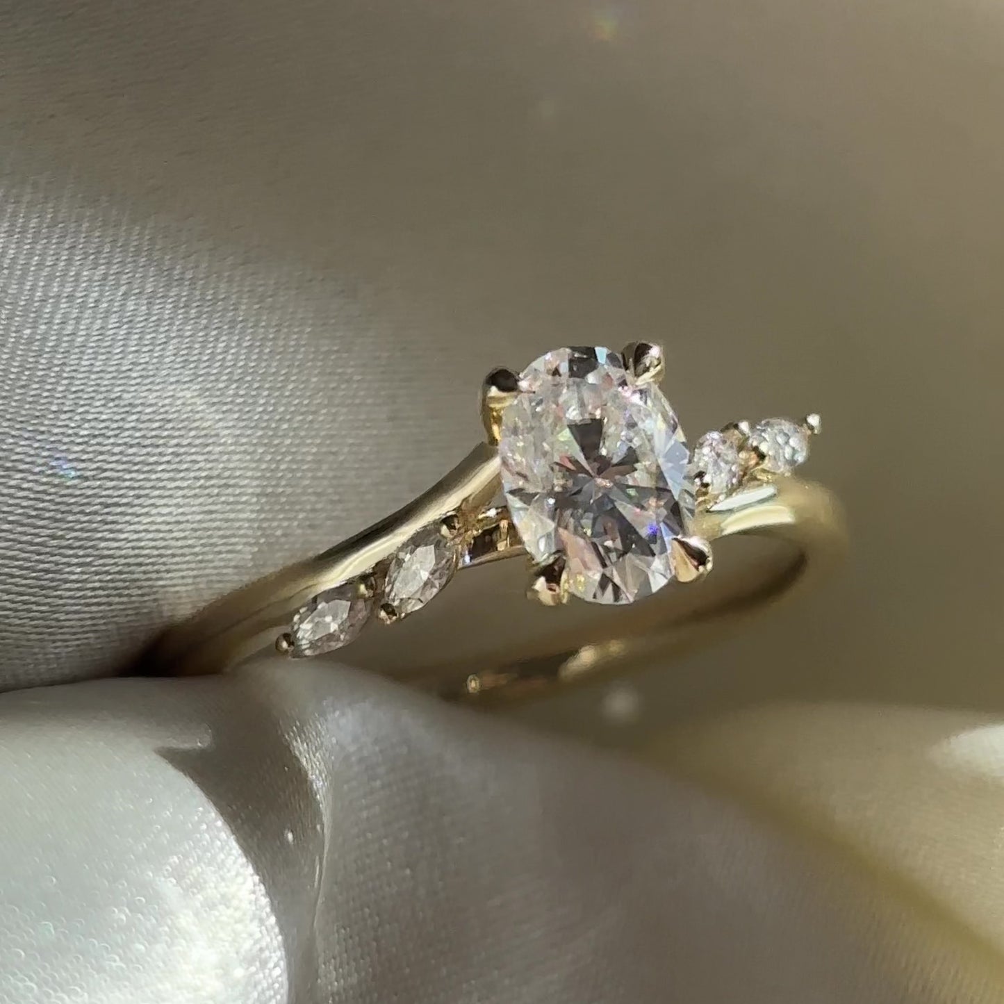 The Amira Ring™ - 1.0ct Moissanite Oval with Marquise Accents