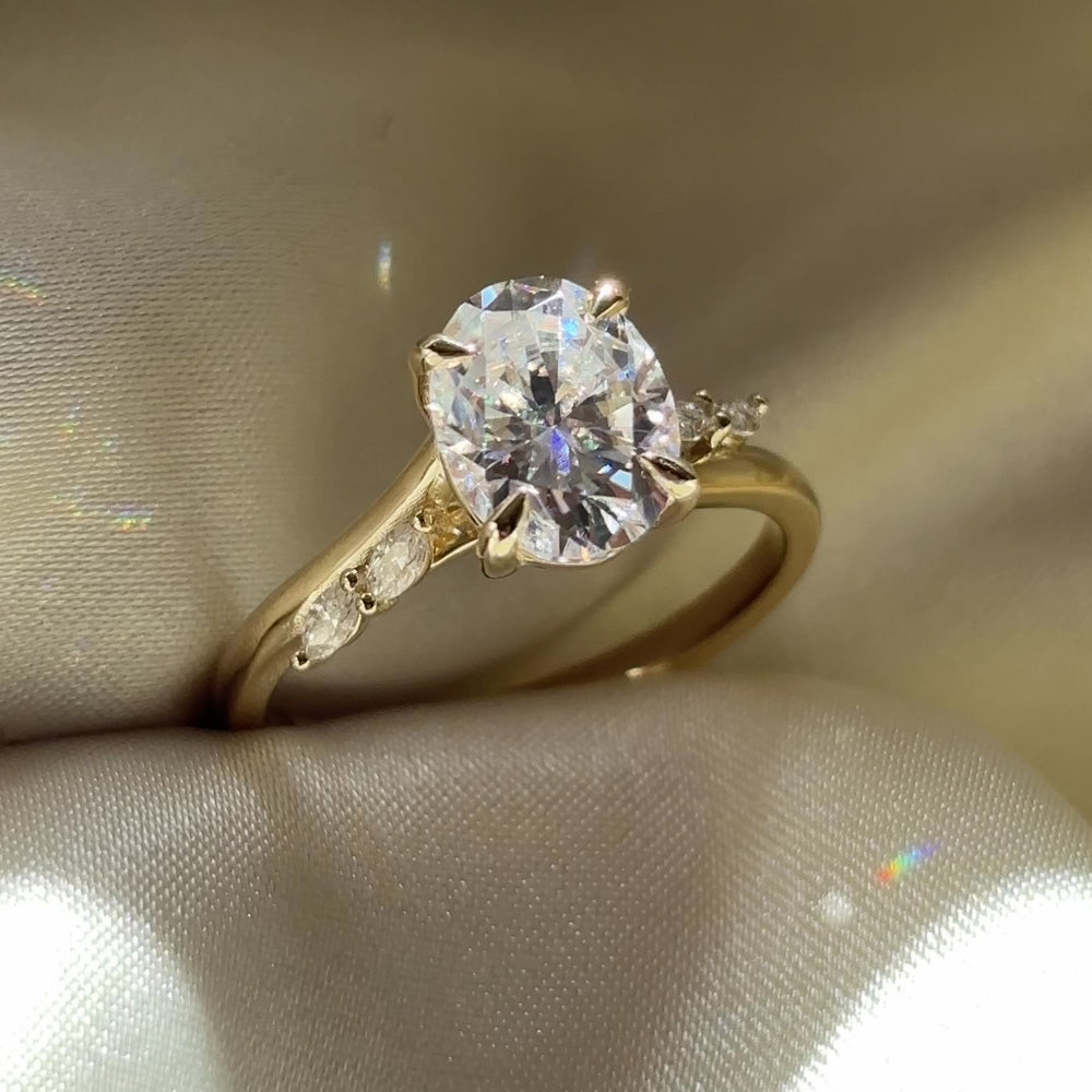 The Amira Ring™ - 2.1ct Moissanite Oval with Marquise Accents