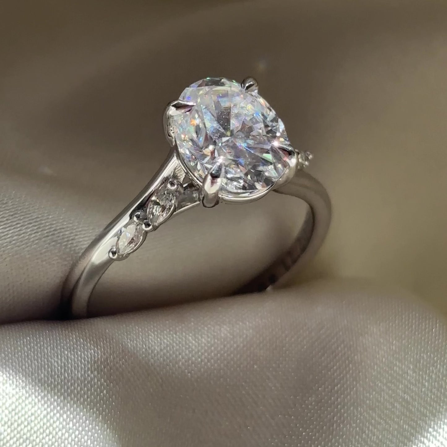 The Amira Ring™ - 2.1ct Moissanite Oval with Marquise Accents