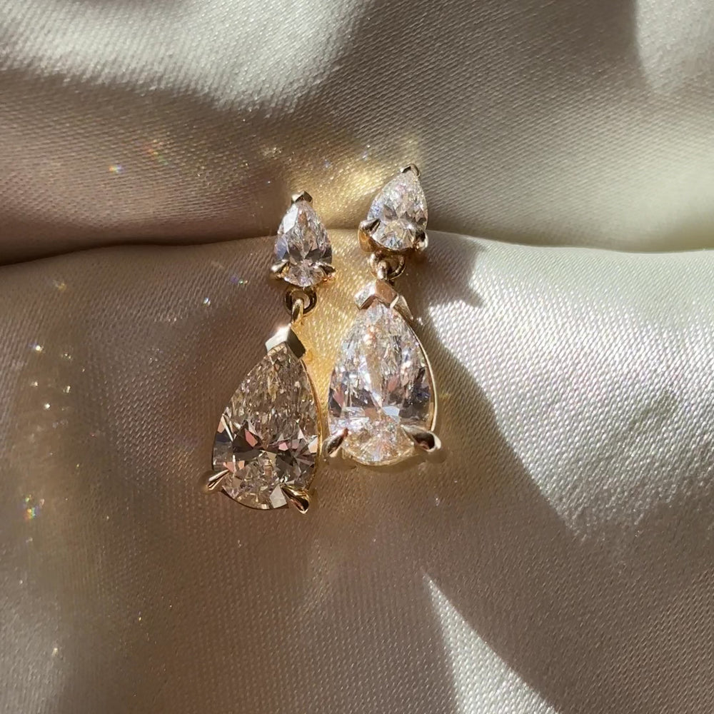 
                      
                        Load and play video in Gallery viewer, The Arietta Earrings - 2.4CTTW Lab Diamond Pear Double Drop Earrings
                      
                    