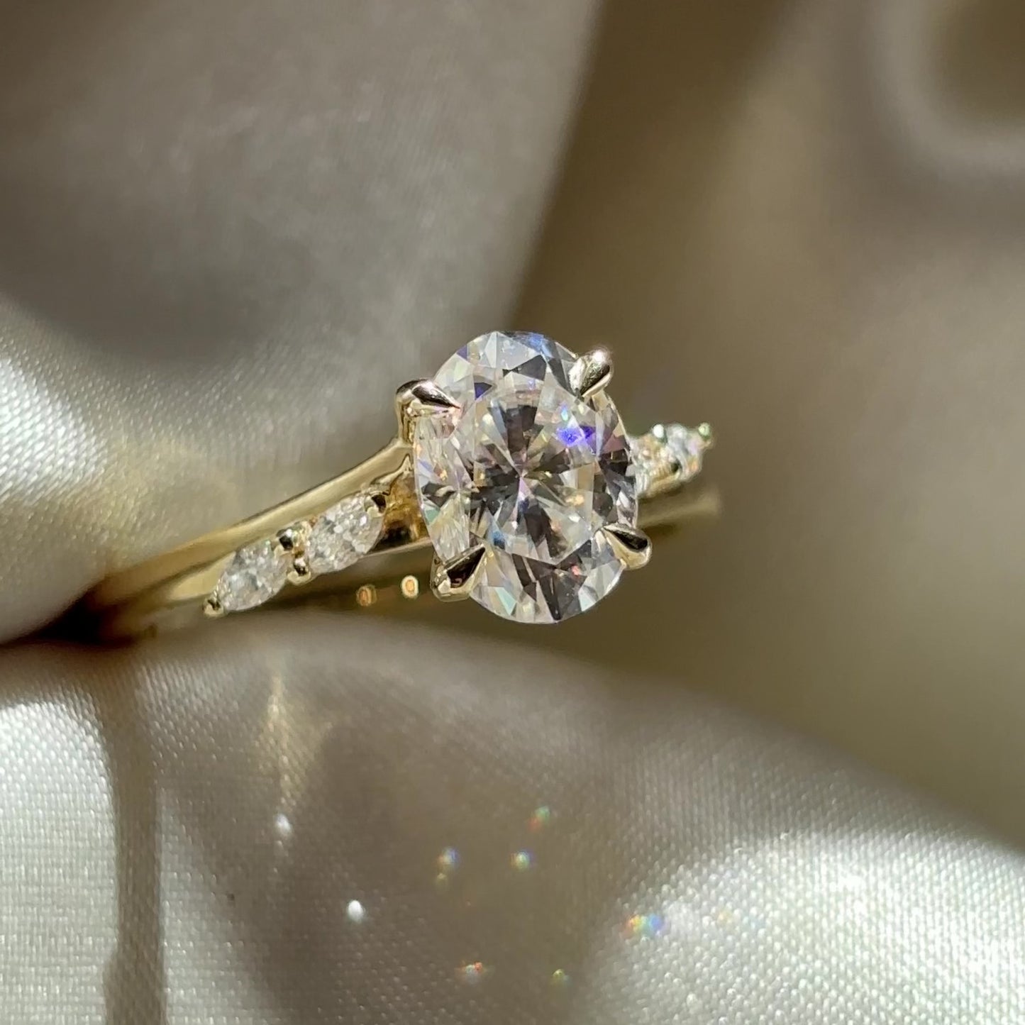 The Amira Ring™ - 1.5ct Moissanite Oval with Marquise Accents