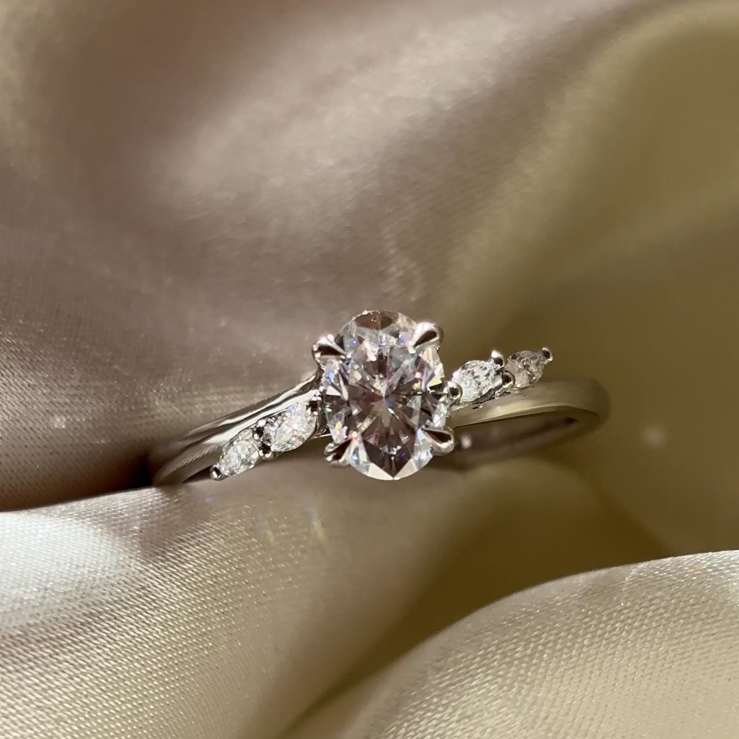 The Amira Ring - 1.0ct Moissanite Oval with Marquise Accents