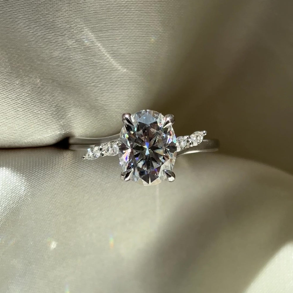 The Amira Ring™ - 2.1ct Moissanite Oval with Marquise Accents