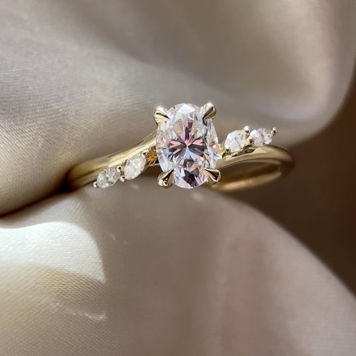The Amira Ring™ - 1.0ct Moissanite Oval with Marquise Accents